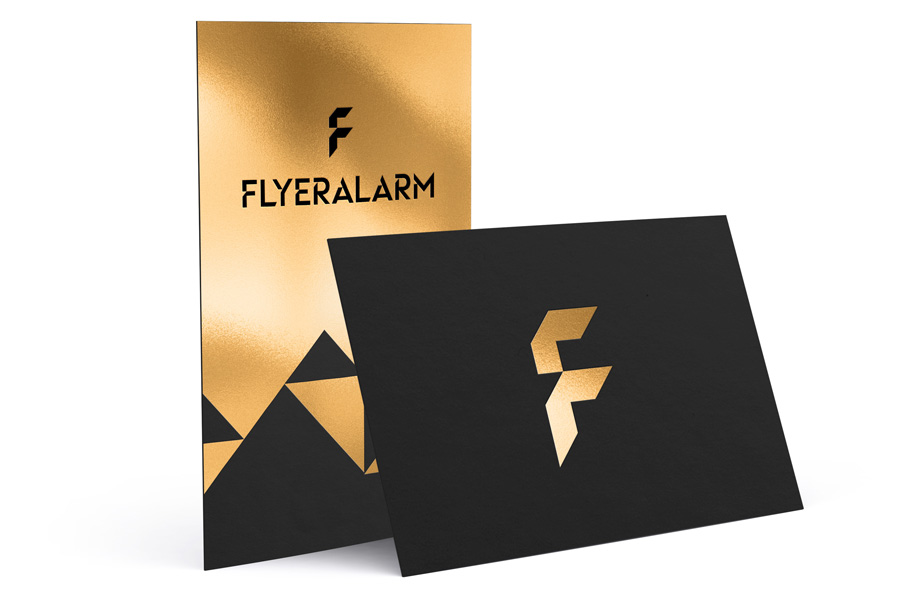 Business cards made from black card with gold hot foil finish